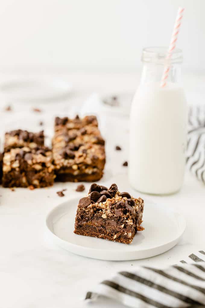 Caramel Bacon Brownies - Salty and sweet are the BEST combination! These decadent brownies are only improved by the salty bacon bits.