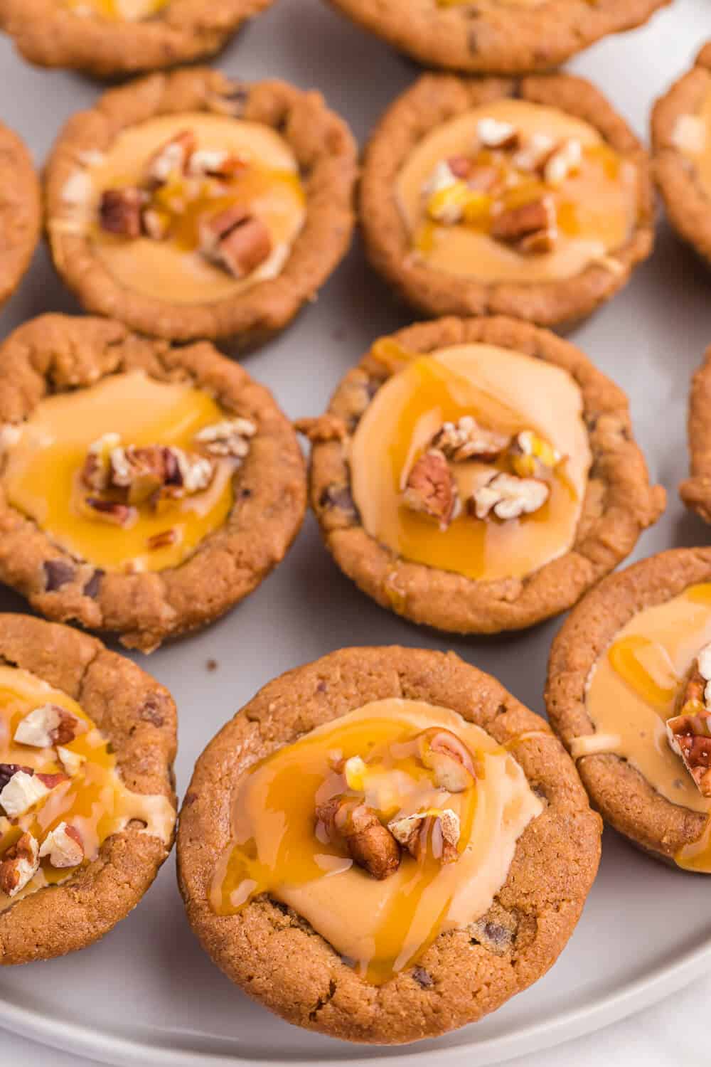 caramel cookie cups on a white plate