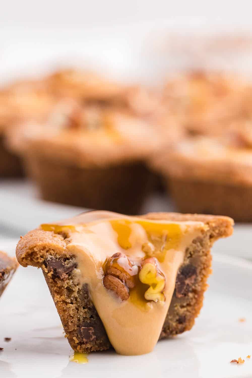 A caramel cookie cup cut in half