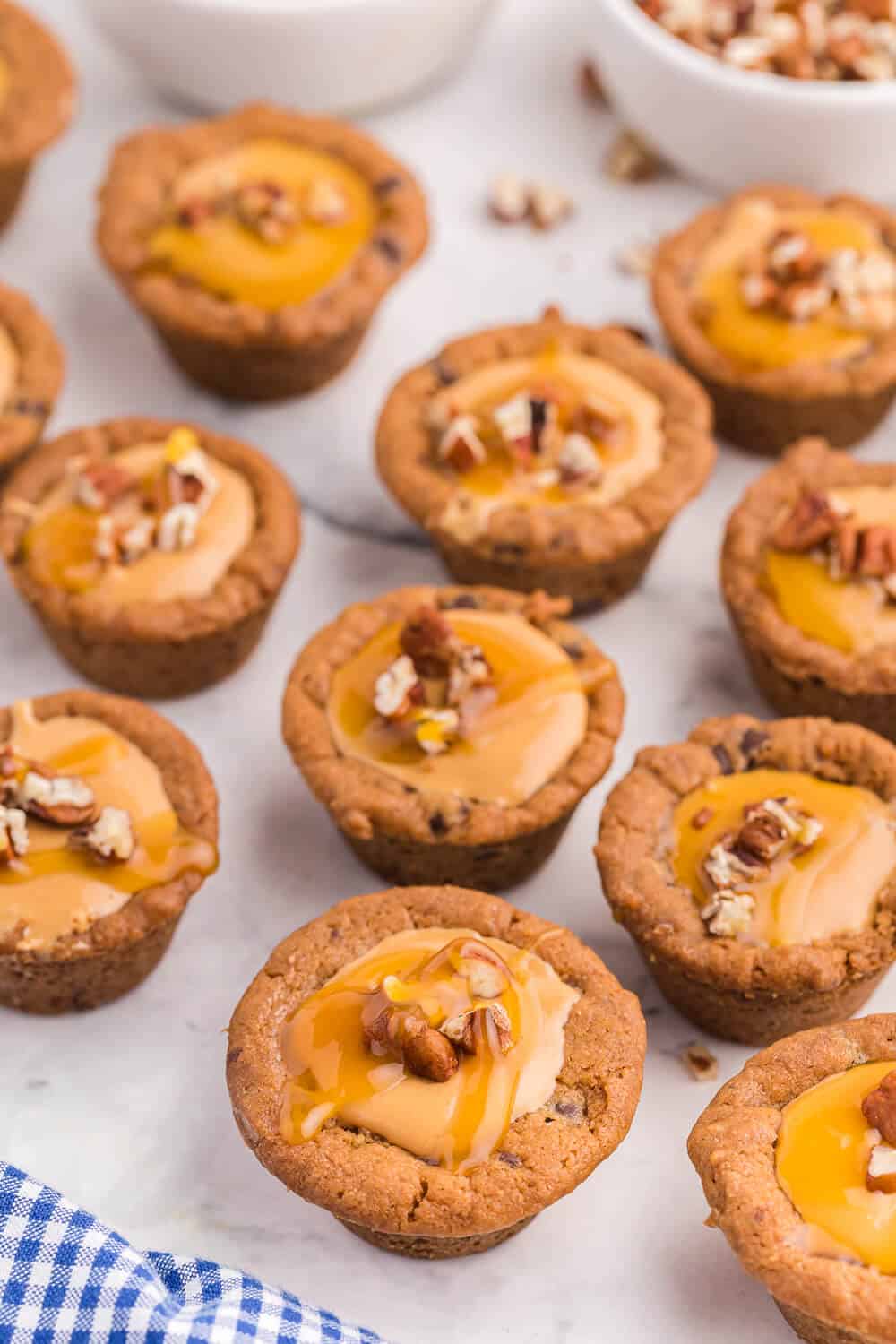 caramel cookie cups on a white surface