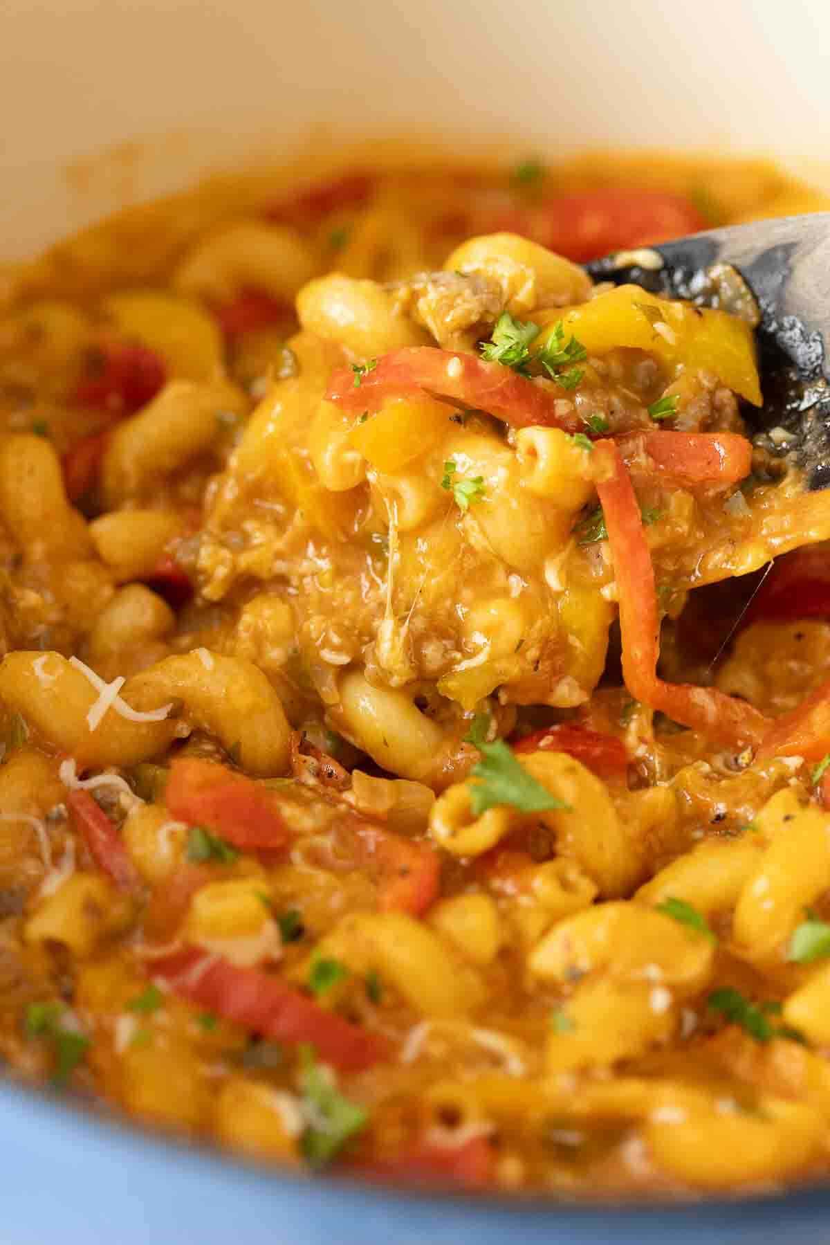 The recipe on a serving spoon in a pot.