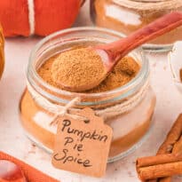 The recipe in a jar with a wooden spoon.