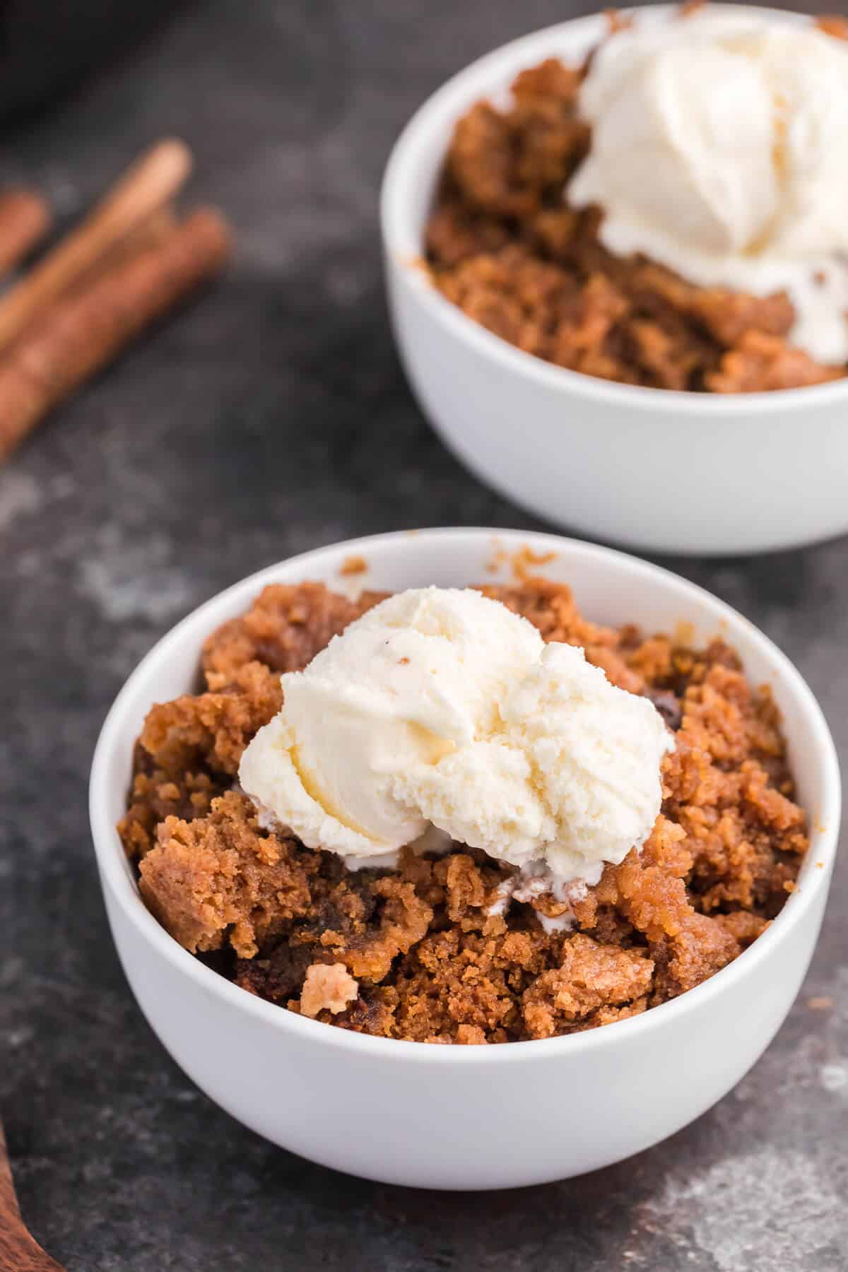 Slow Cooker Pumpkin Dump Cake - This is the easiest fall dessert! Your family will beg for this Crockpot dessert recipe made with boxed cake mix all year long.