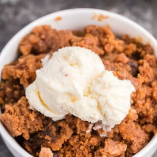 Slow Cooker Pumpkin Dump Cake - This delicious fall dessert is quick and easy! The slow cooker can truly beat your oven for perfectly moist dump cakes.