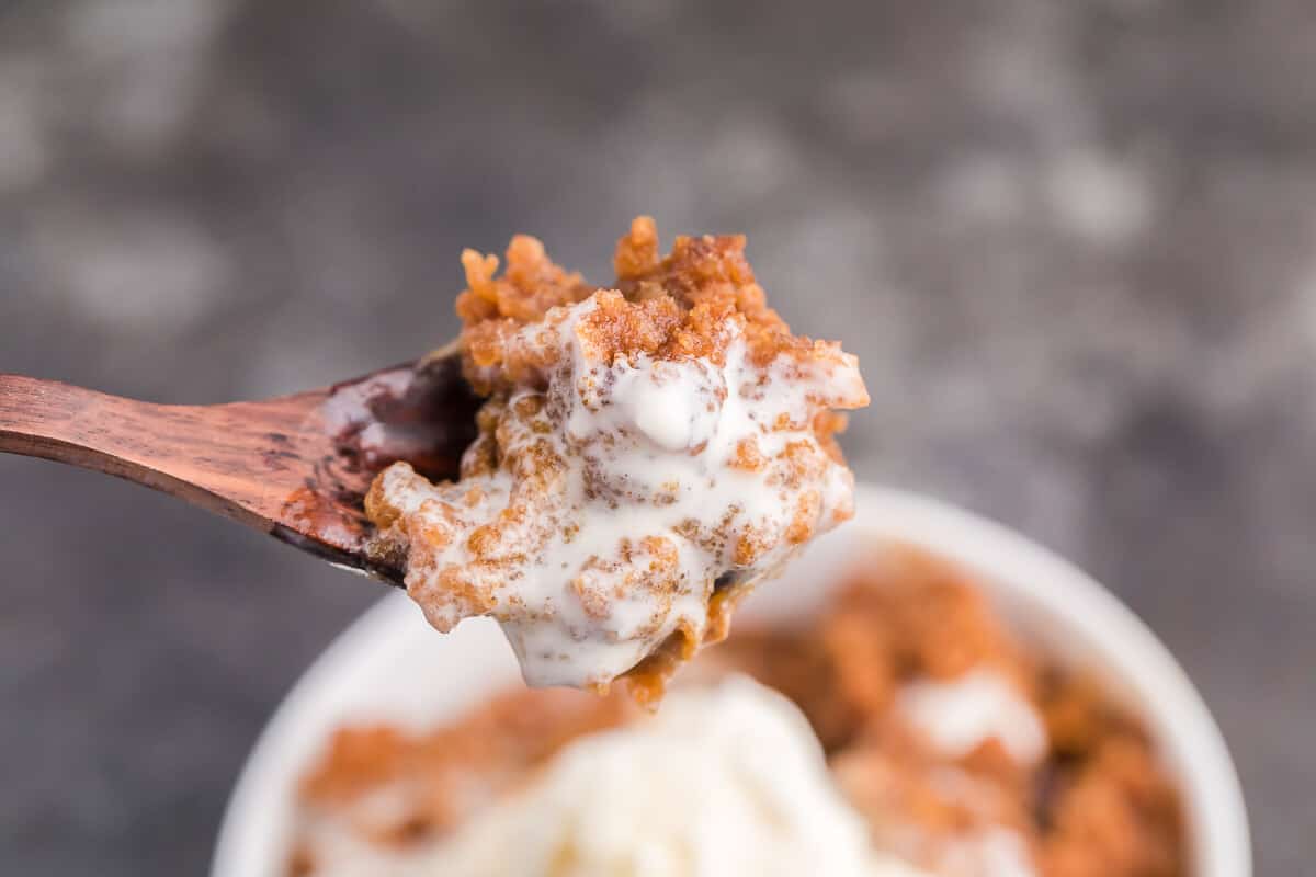 Slow Cooker Pumpkin Dump Cake - This is the easiest fall dessert! Your family will beg for this Crockpot dessert recipe made with boxed cake mix all year long.