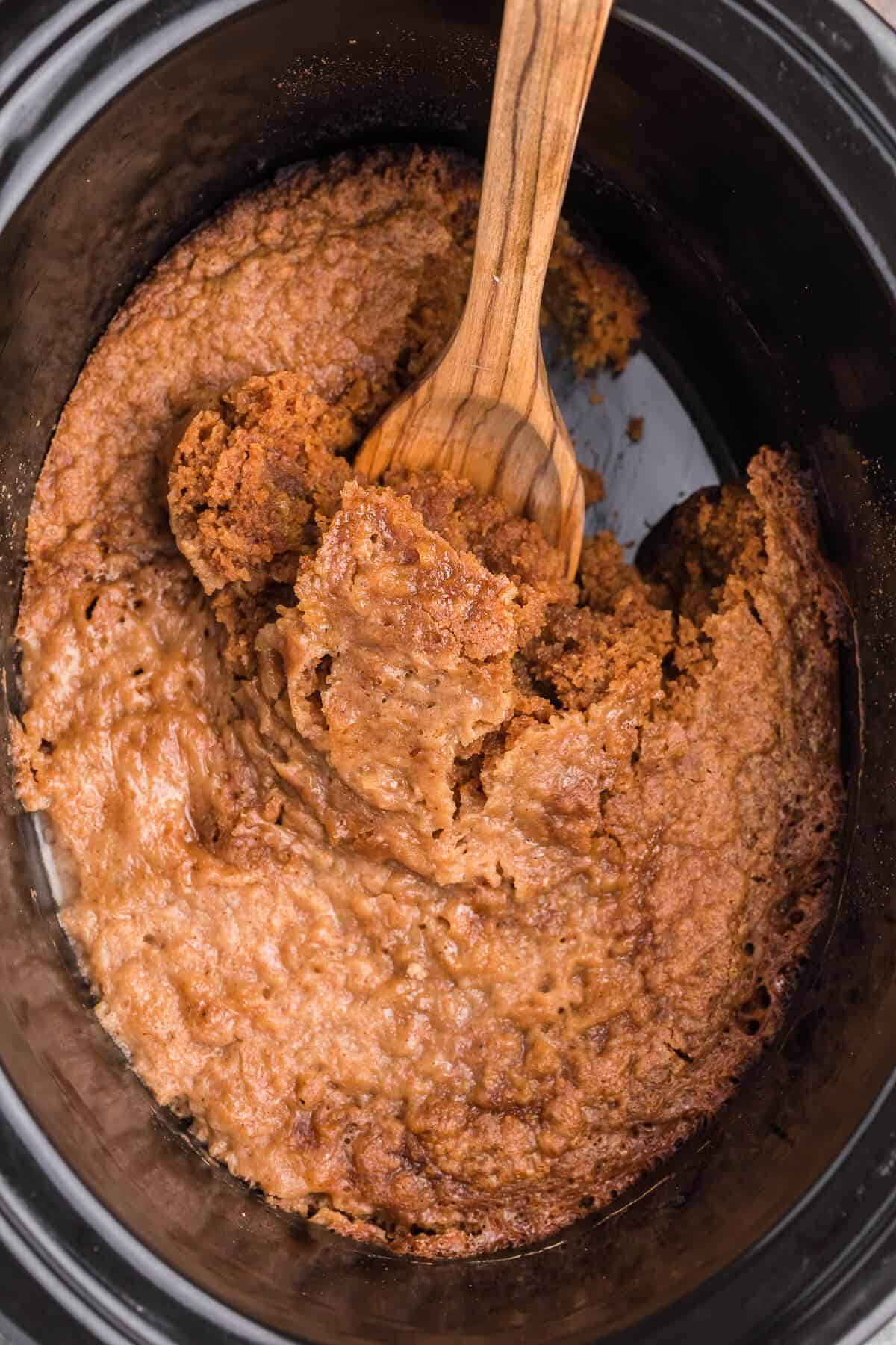 Slow Cooker Pumpkin Dump Cake - This is the easiest fall dessert! Your family will beg for this Crockpot dessert recipe made with boxed cake mix all year long.