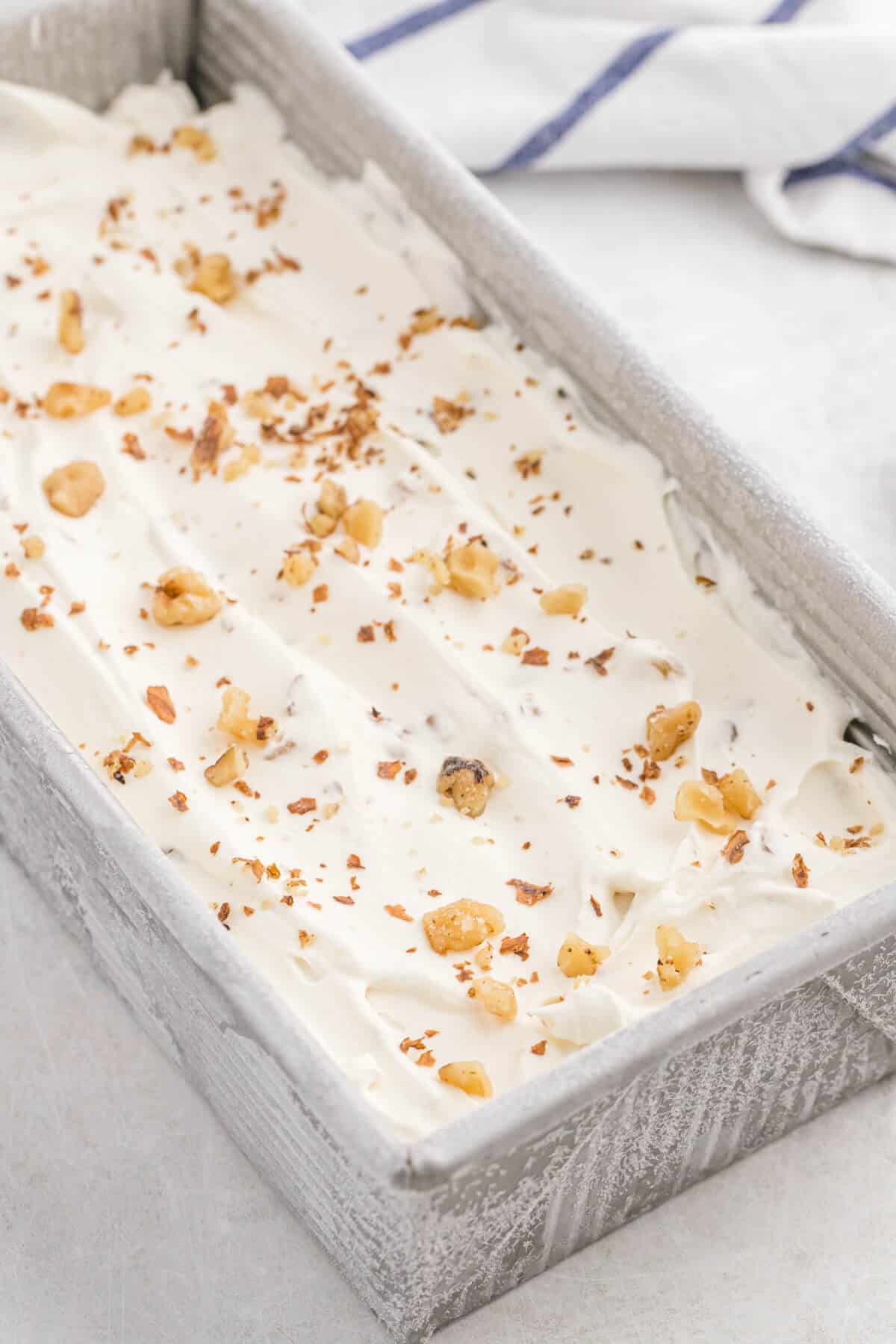 Maple walnut ice cream in a loaf pan.