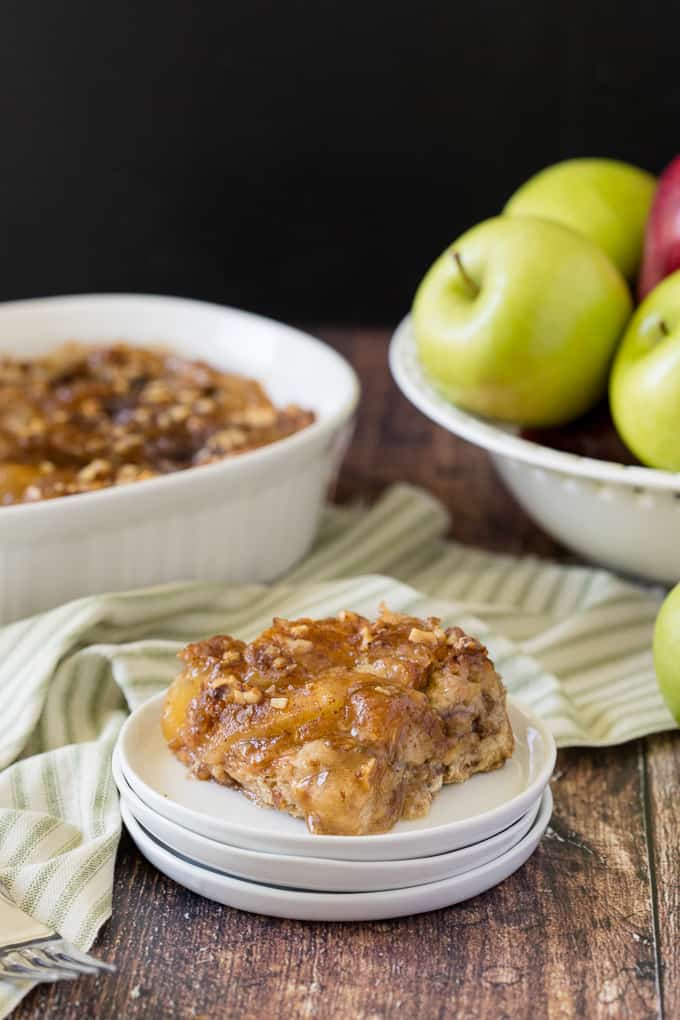 Apple Pie French Toast Casserole - A cross between apple pie and French toast, you will feel like you are eating dessert for breakfast....or breakfast for dessert! Chock full of delicious apples and cinnamon with a creamy, custardy bread layer, this is a satisfying beginning to the day, or end of a meal!