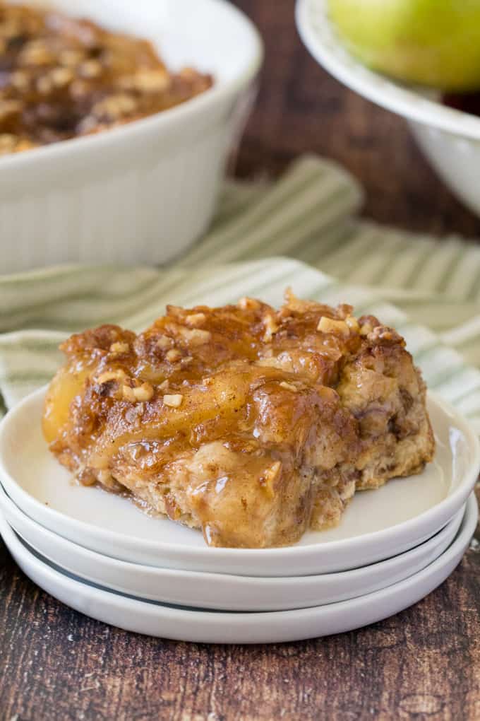 Apple Pie French Toast Casserole - A cross between apple pie and French toast, you will feel like you are eating dessert for breakfast....or breakfast for dessert! Chock full of delicious apples and cinnamon with a creamy, custardy bread layer, this is a satisfying beginning to the day, or end of a meal!