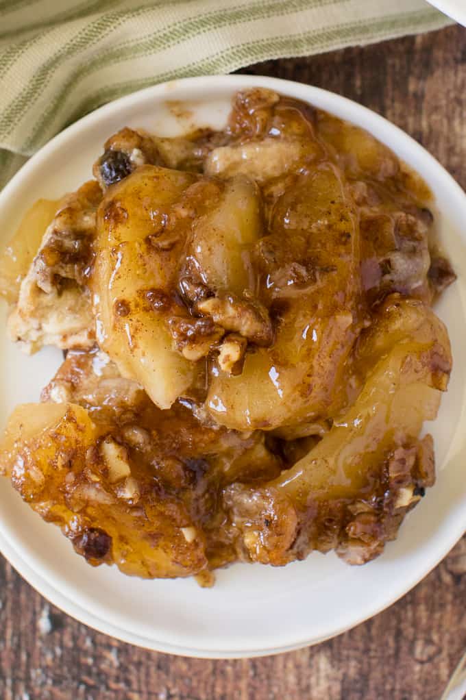 Apple Pie French Toast Casserole - A cross between apple pie and French toast, you will feel like you are eating dessert for breakfast....or breakfast for dessert! Chock full of delicious apples and cinnamon with a creamy, custardy bread layer, this is a satisfying beginning to the day, or end of a meal!