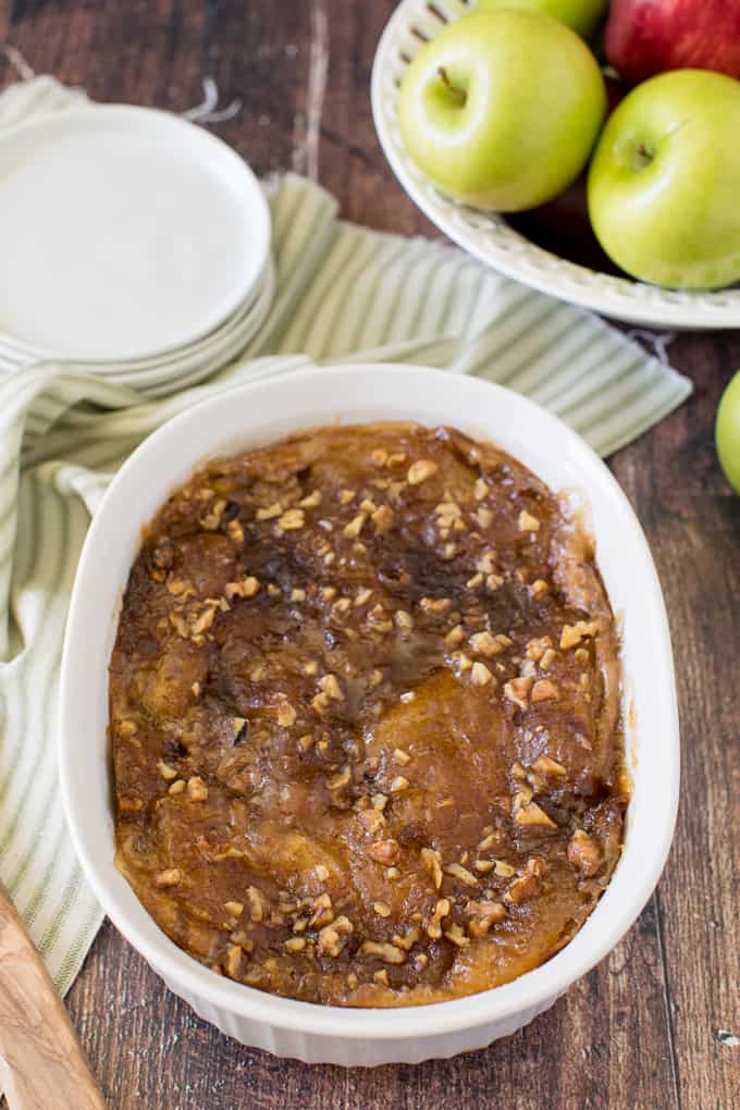 Apple Pie French Toast Casserole - A cross between apple pie and French toast, you will feel like you are eating dessert for breakfast....or breakfast for dessert! Chock full of delicious apples and cinnamon with a creamy, custardy bread layer, this is a satisfying beginning to the day, or end of a meal!