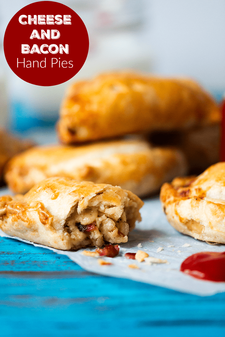 Cheese and Bacon Hand Pies - Hearty and comforting! These handheld meat pies are stuffed with bacon and cheese for a savory treat at any meal.