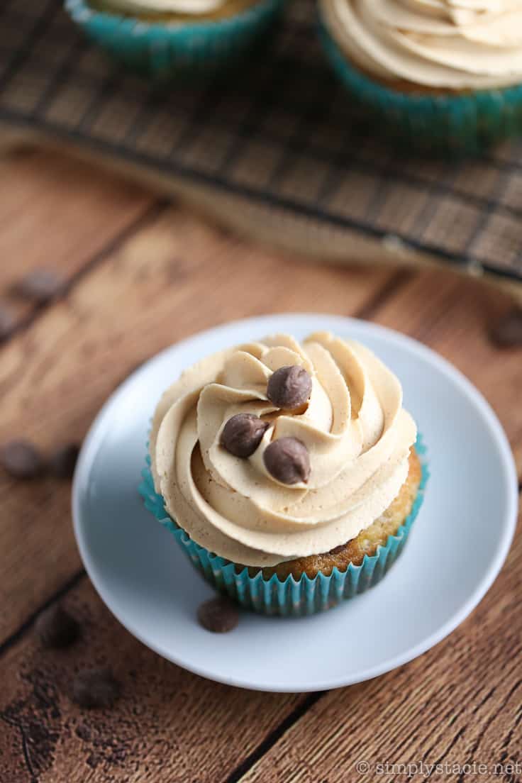 Banana Chocolate Chip Cupcakes with Peanut Butter Frosting - Bananas, peanut butter, and chocolate – oh my! These cupcakes bring the king combination for this moist dessert.