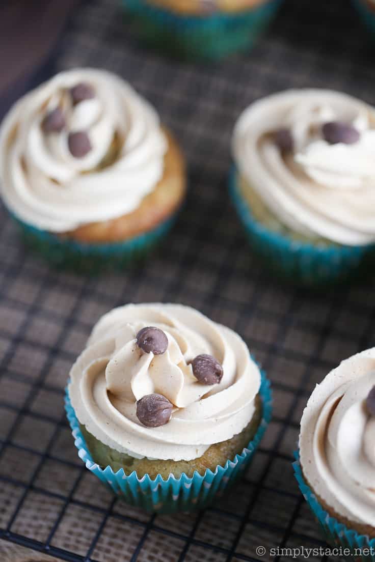 Banana Chocolate Chip Cupcakes with Peanut Butter Frosting - Bananas, peanut butter, and chocolate – oh my! These cupcakes bring the king combination for this moist dessert.