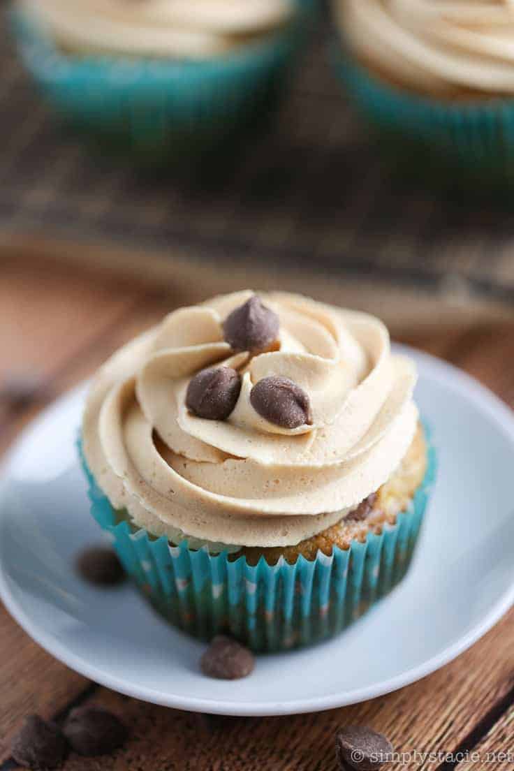 Banana Chocolate Chip Cupcakes with Peanut Butter Frosting - Bananas, peanut butter, and chocolate – oh my! These cupcakes bring the king combination for this moist dessert.