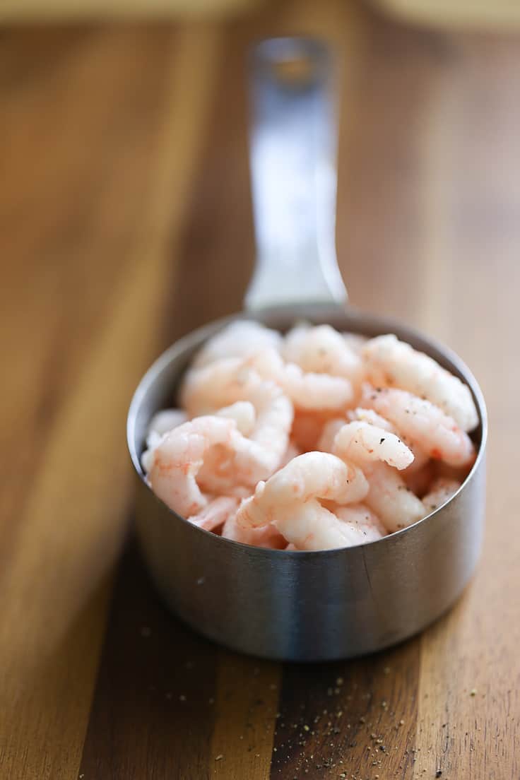 Seafood Caesar Salad - With salmon, shrimp and crab packed into every bite, seafood fans are in for a real treat with this delicious recipe for Seafood Caesar Salad.