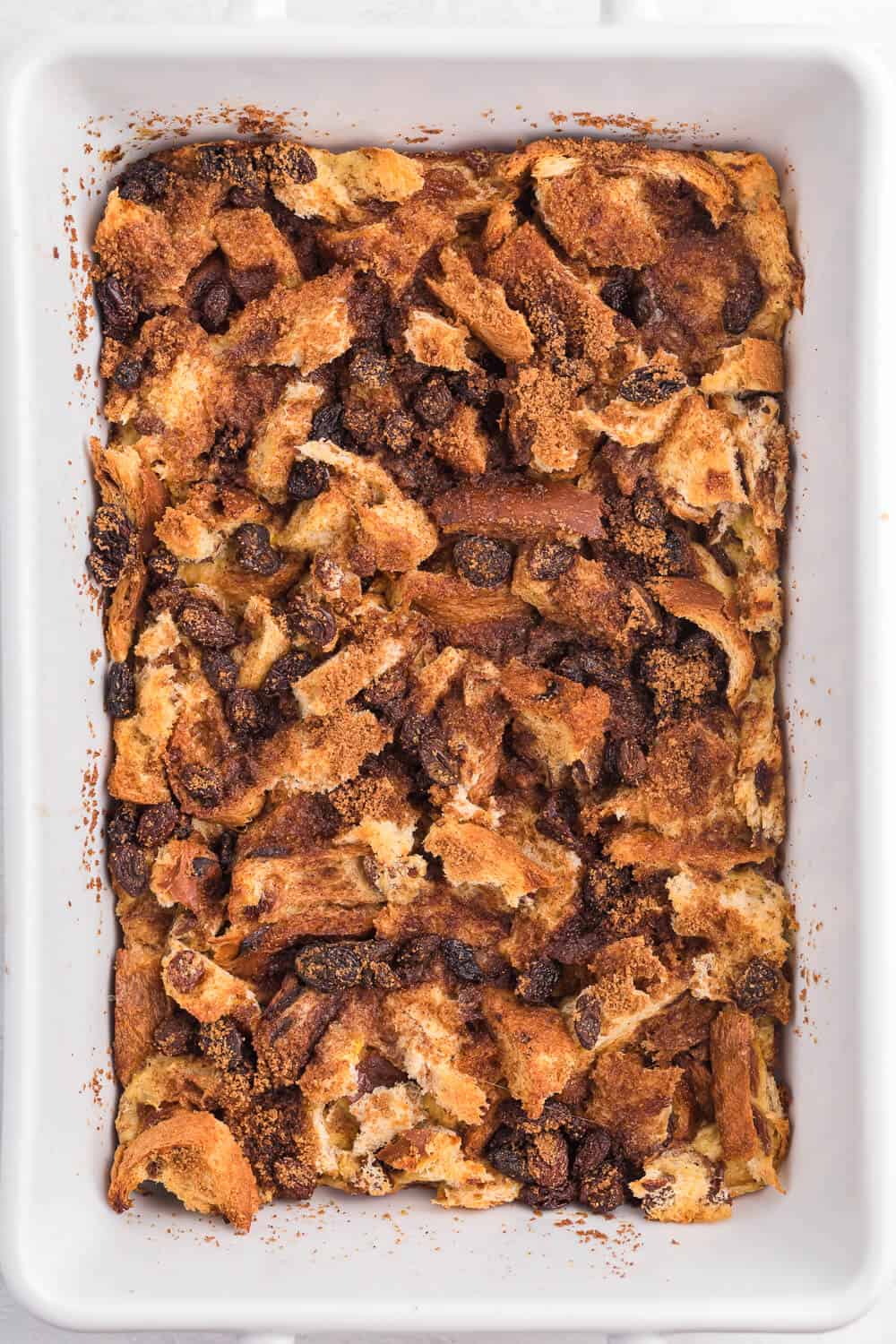 Cinnamon Raisin Breakfast Casserole - Sweeten your mornings with this divine Cinnamon Raisin Breakfast Casserole recipe! It's bursting with raisins, cinnamon and yummy raisin bread.