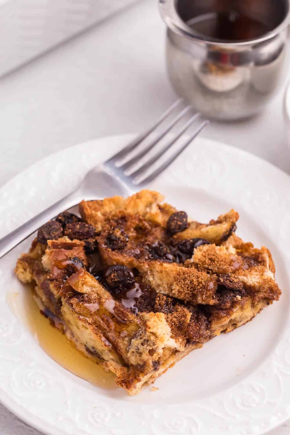 Cinnamon Raisin French Toast Casserole - Sweeten your mornings with this divine baked French Toast casserole recipe! It’s bursting with raisins, cinnamon and yummy raisin bread.