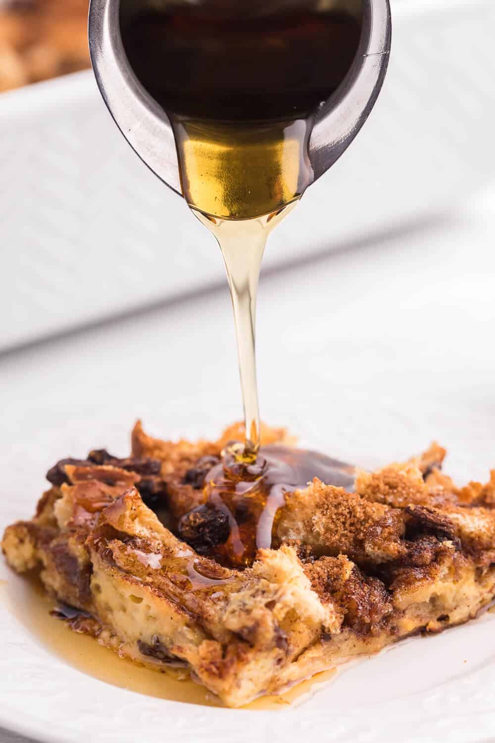 Cinnamon Raisin French Toast Casserole - Sweeten your mornings with this divine baked French Toast casserole recipe! It’s bursting with raisins, cinnamon and yummy raisin bread.