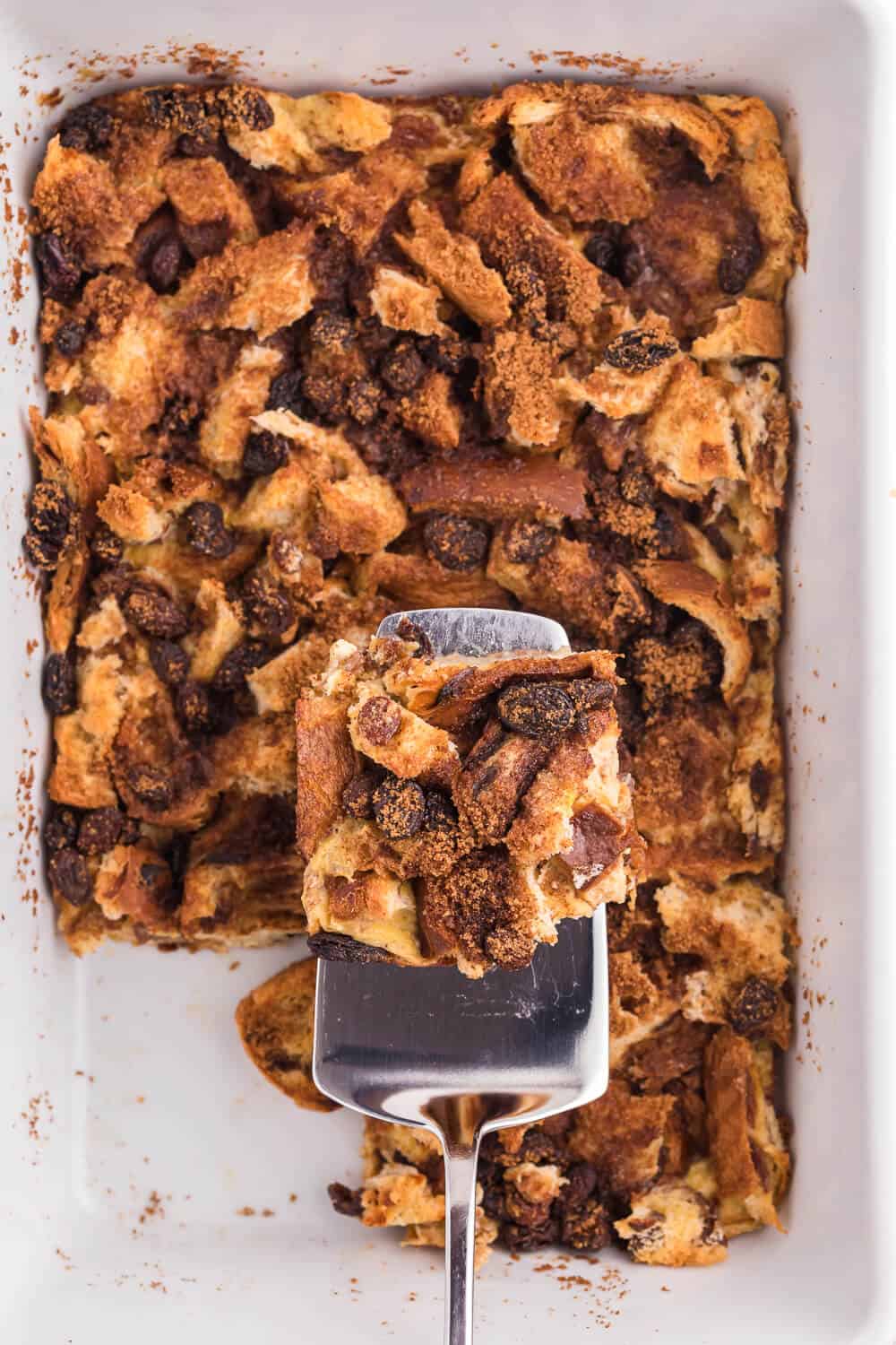 Cinnamon Raisin French Toast Casserole - Sweeten your mornings with this divine baked French Toast casserole recipe! It’s bursting with raisins, cinnamon and yummy raisin bread.
