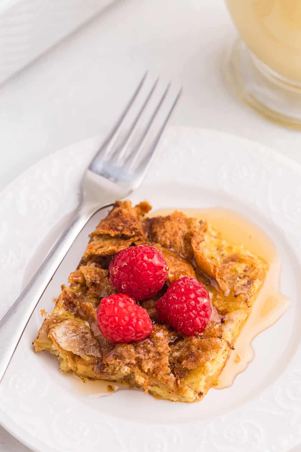 Eggnog Breakfast Casserole - Nothing says "holidays" like eggnog! This breakfast casserole is made extra special with a croissant base, a sprinkling of sweet brown sugar, cinnamon and nutmeg.