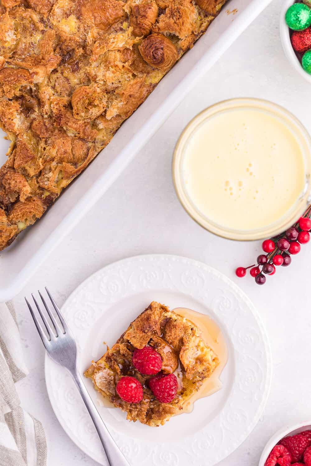 Eggnog Breakfast Casserole - Nothing says "holidays" like eggnog! This breakfast casserole is made extra special with a croissant base, a sprinkling of sweet brown sugar, cinnamon and nutmeg.