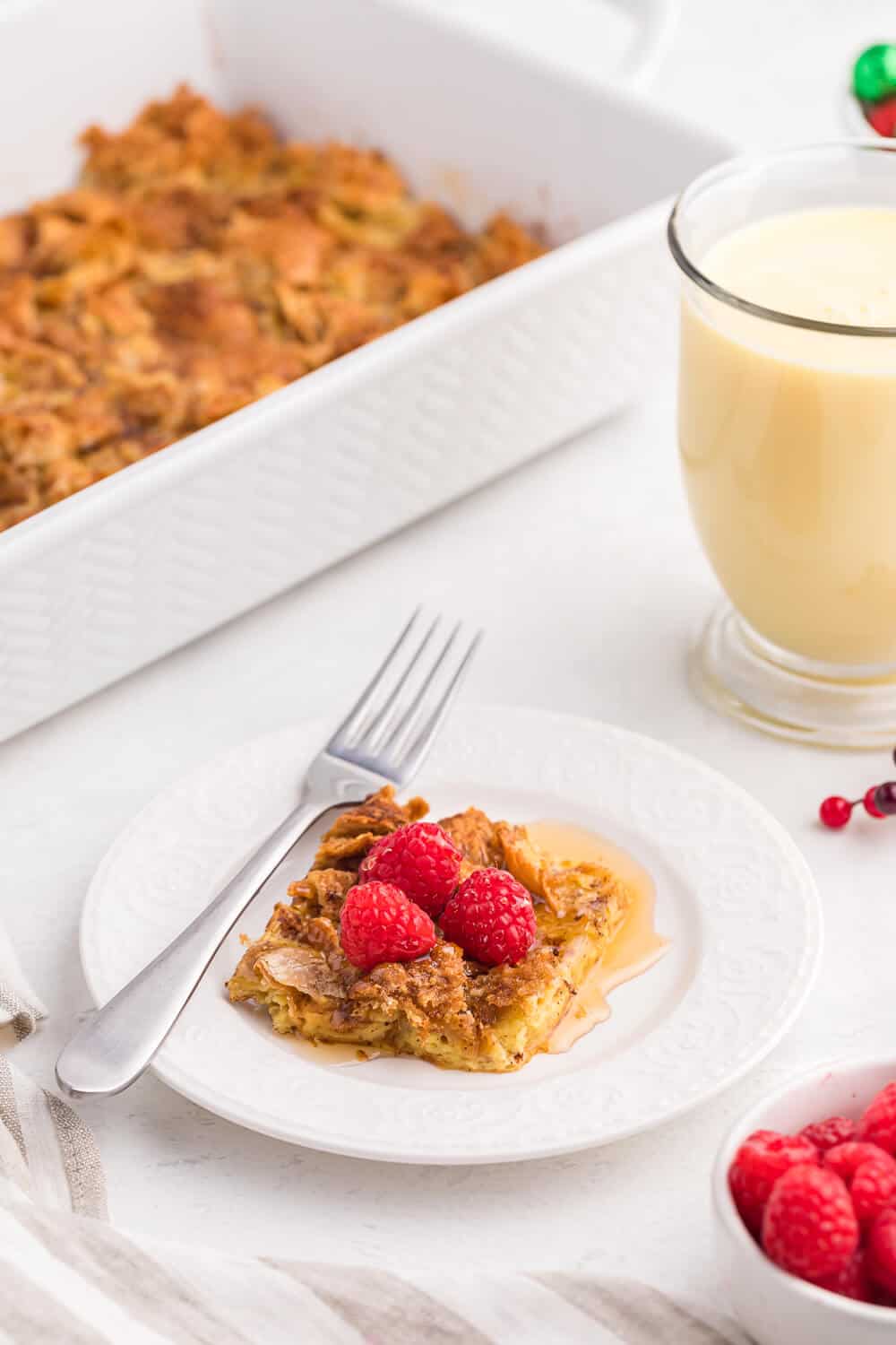 Eggnog Breakfast Casserole - Nothing says "holidays" like eggnog! This breakfast casserole is made extra special with a croissant base, a sprinkling of sweet brown sugar, cinnamon and nutmeg.