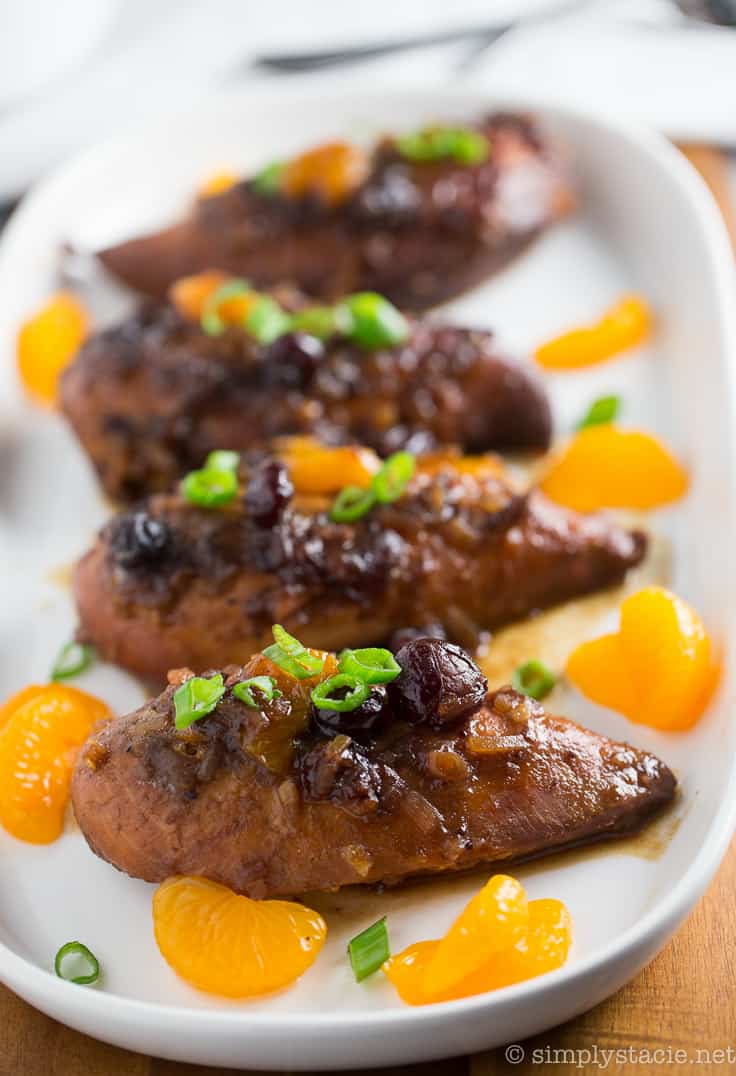 Slow Cooker Cranberry Orange Chicken - Add a tangy twist to your orange chicken! This Crockpot chicken recipe is perfect for the holiday season with cranberry sauce, ginger, and balsamic vinegar in this Asian-inspired main dish.