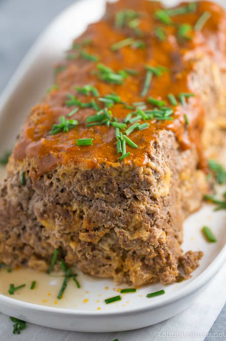 Indian Meatloaf - A Middle Eastern twist on an American classic! This ground beef and pork dish is packed with Vindaloo sauce with more on top.