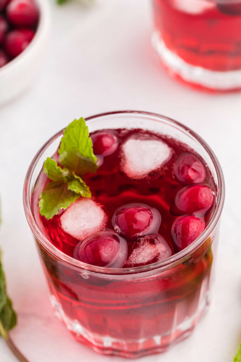 A glass of the recipe on a white surface.