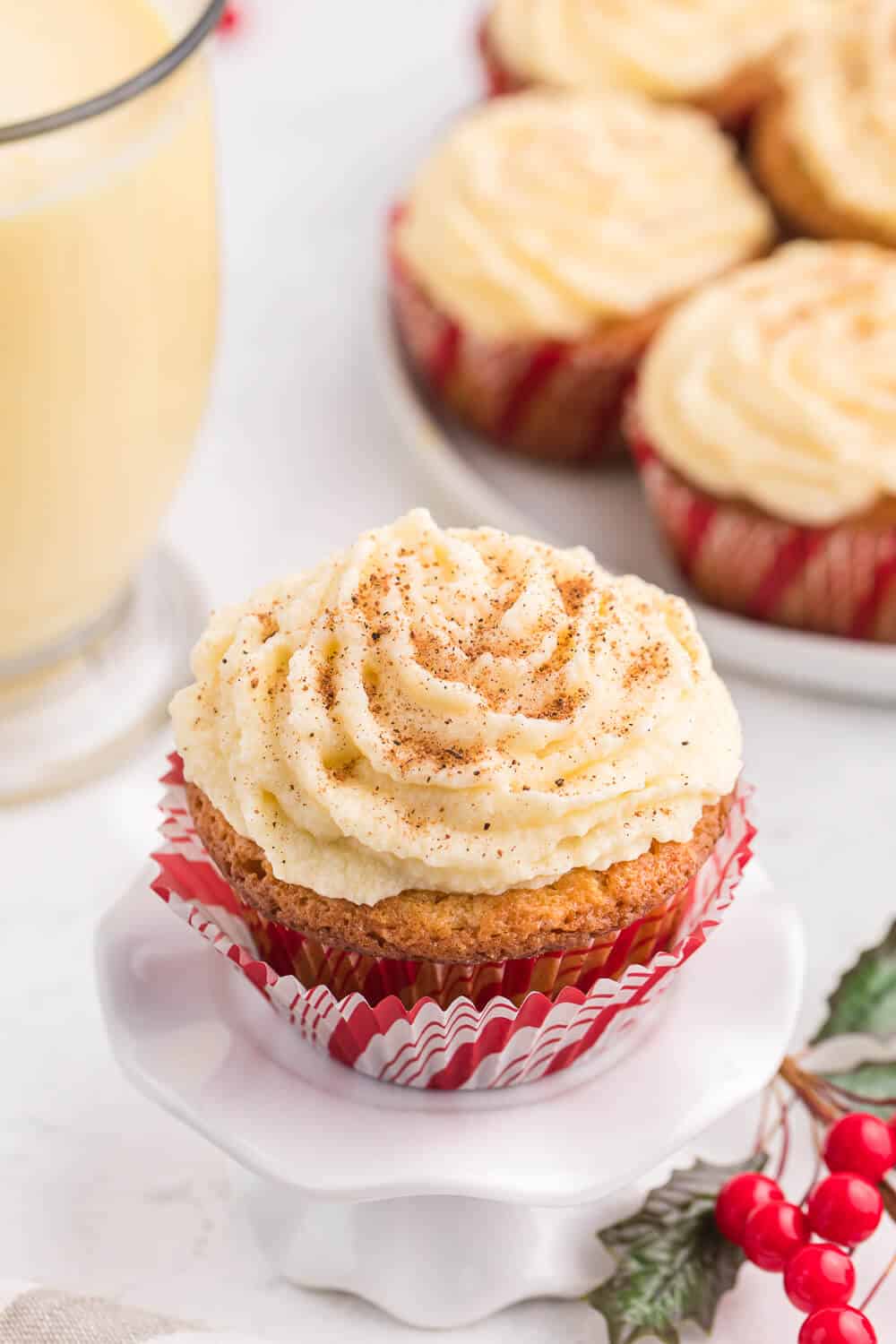 Eggnog cupcake on a white cupcake stand