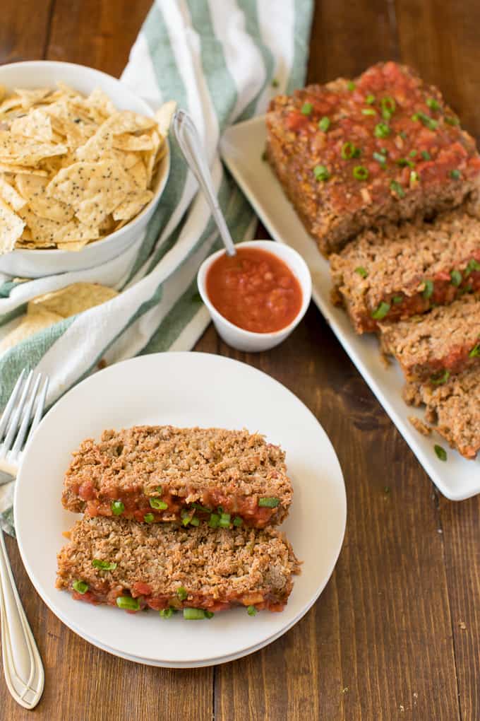 Mexican Meatloaf - A classic recipe with a spicy twist! Beef, cheese, seasonings, chilies and salsa results in a mouthwatering meal.