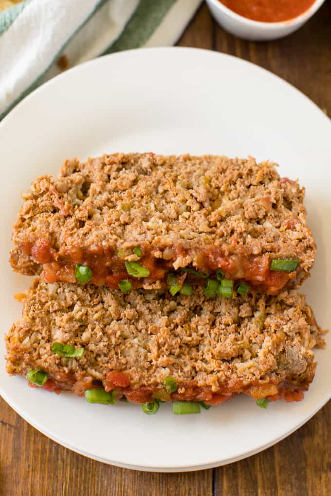 Mexican Meatloaf - A classic recipe with a spicy twist! Beef, cheese, seasonings, chilies and salsa results in a mouthwatering meal.