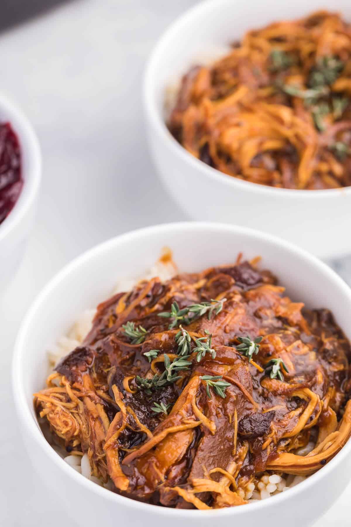 Slow Cooker Cranberry Chicken - Tender chicken breasts slow cooked with a sweet & savoury cranberry sauce flavoured with ginger and allspice.