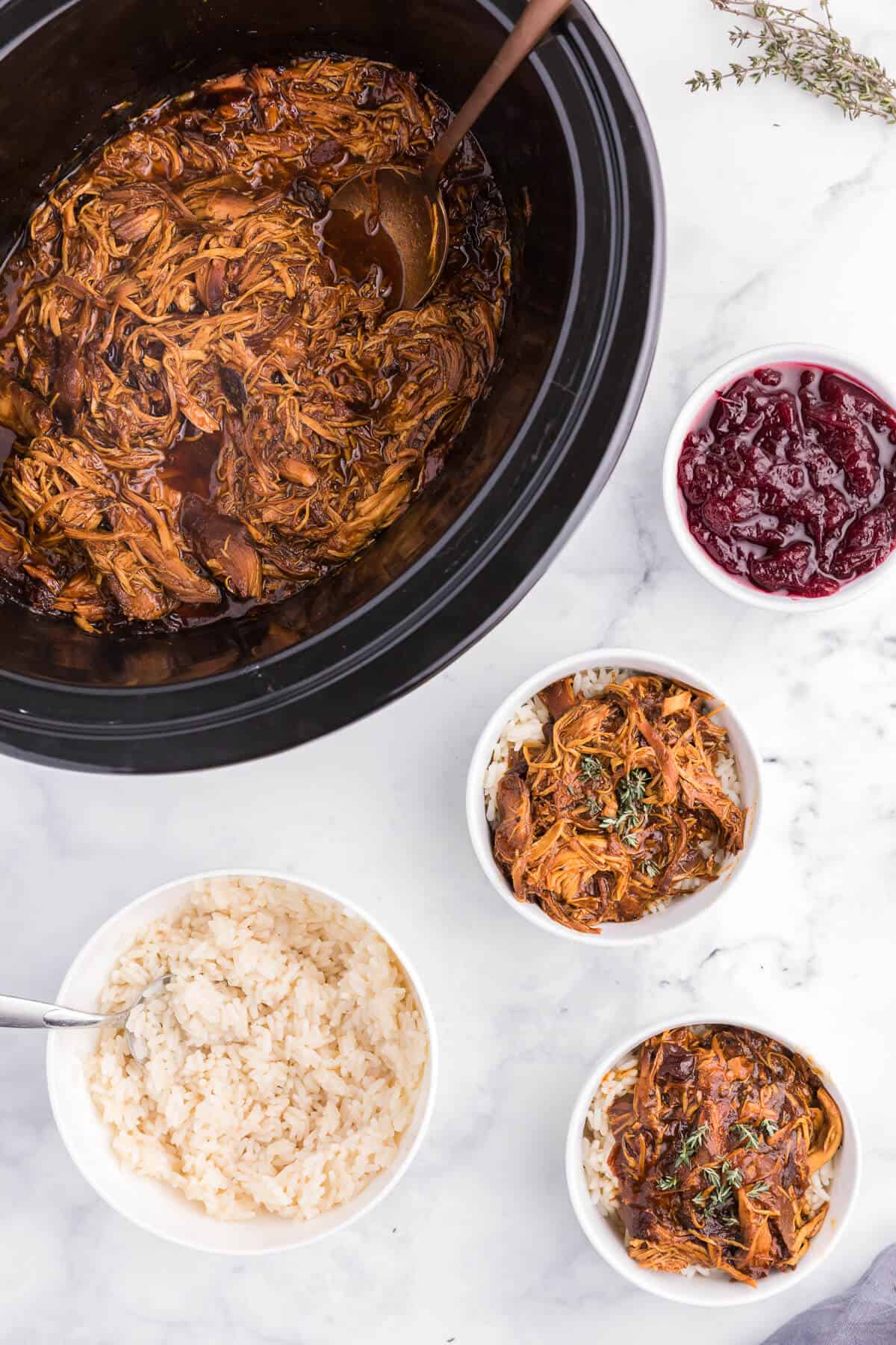 Slow Cooker Cranberry Chicken - Tender chicken breasts slow cooked with a sweet & savoury cranberry sauce flavoured with ginger and allspice.