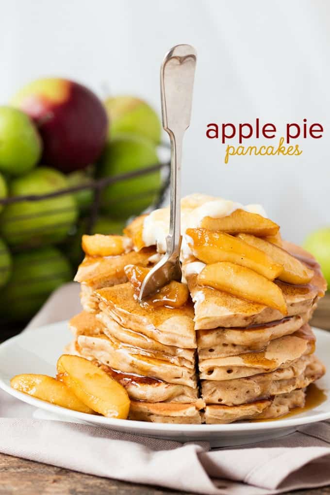 Apple Pie Pancakes - A spiced apple pancake recipe, topped with syrup poached apples and a spoonfuls of creamy, thick crème fraiche. This is one glorious breakfast!