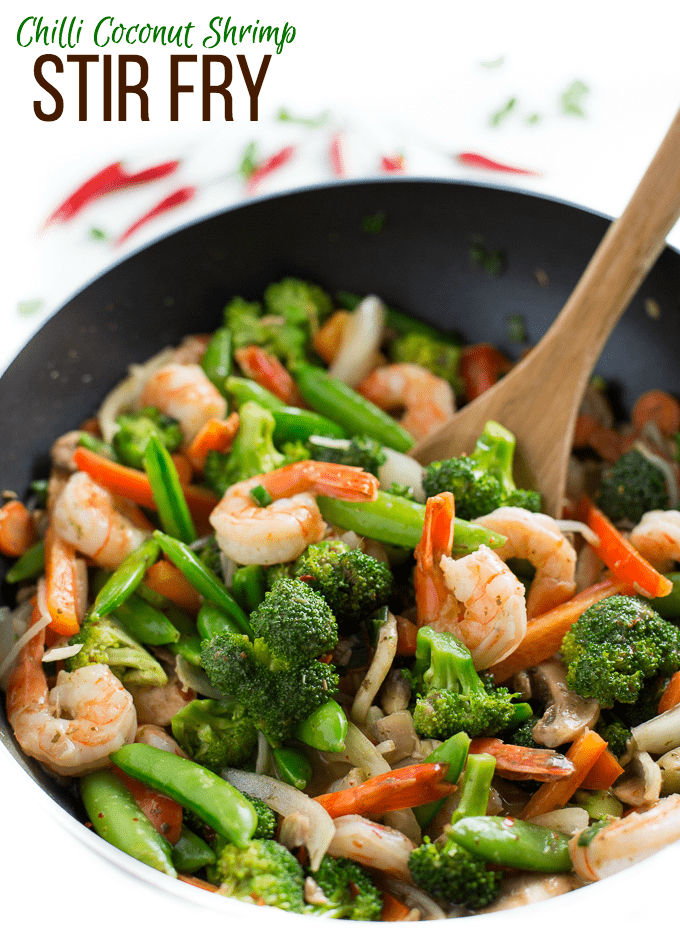Chilli Coconut Shrimp Stir Fry - This stir fry recipe makes it easy to eat your veggies! Packed with shrimp, fresh veggies and a creamy, spicy Chilli Coconut sauce, each bite delights your taste buds and satisfies your hunger.