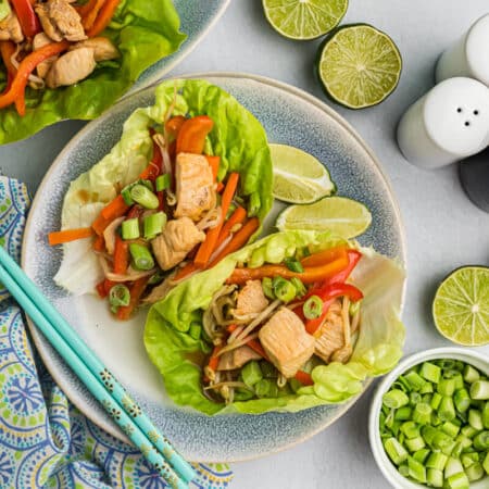 Asian chicken lettuce wraps on a plate.