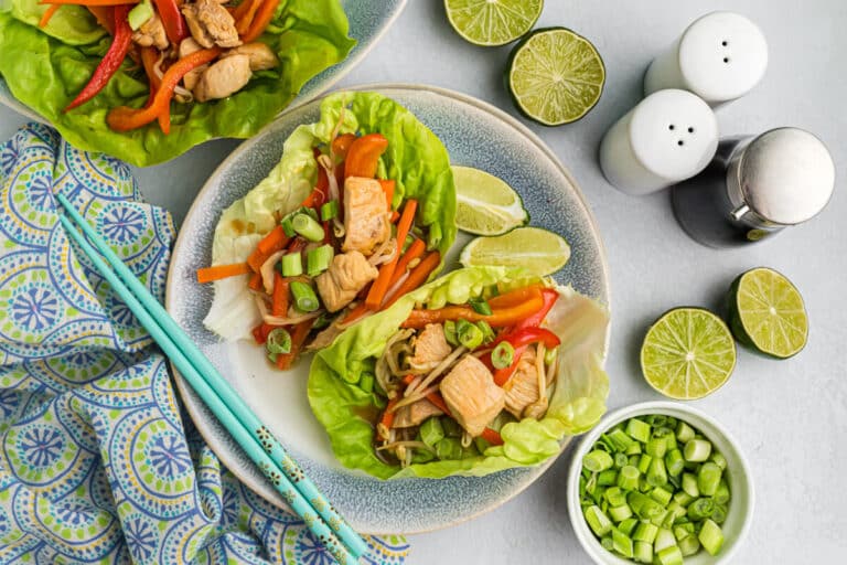 Asian chicken lettuce wraps on a plate.