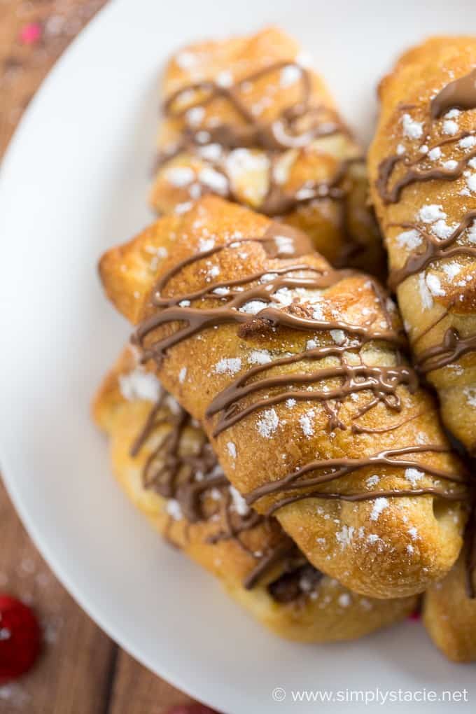 Hugs & Kisses Rolls - Imagine melted Hershey's Hugs and Hershey's Kisses tucked inside a warm crescent roll. Add a little powdered sugar and chocolate drizzle and you have yourself a heavenly treat! The perfect indulgence.