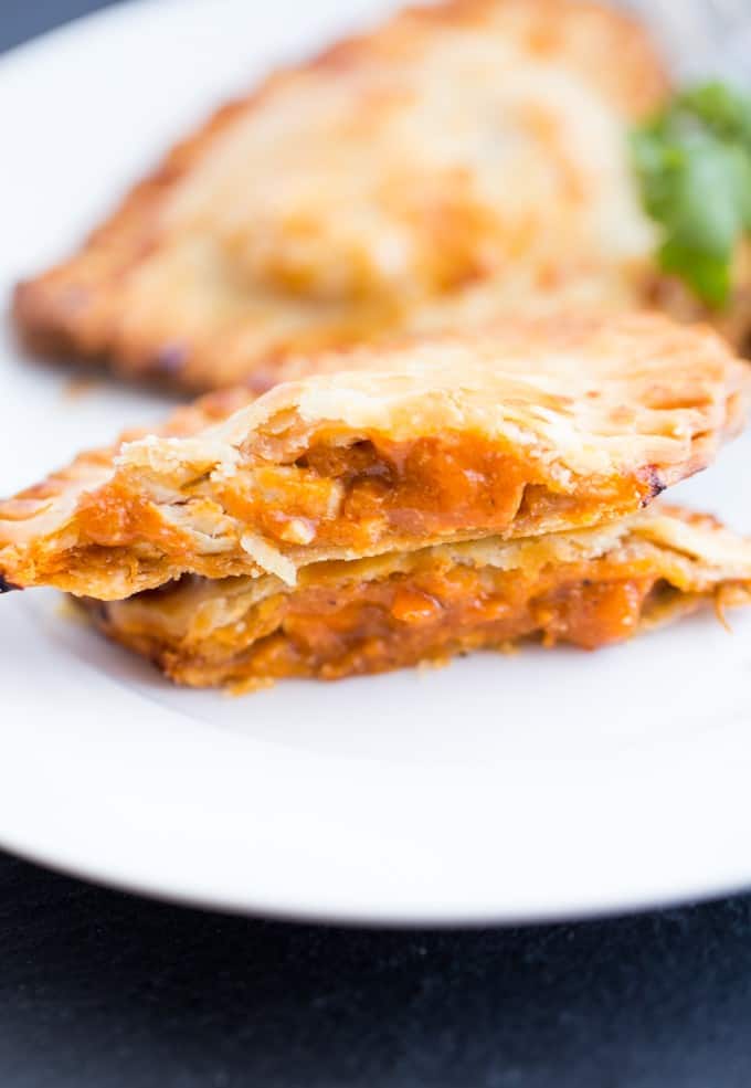 Butter Chicken Hand Pies - The best homemade Valentine's Day dinner ever! Make these heart pies with love and be done in 40 minutes flat. Creamy, flavourful Butter Chicken is stuffed inside a golden, flaky heart shaped crust! 