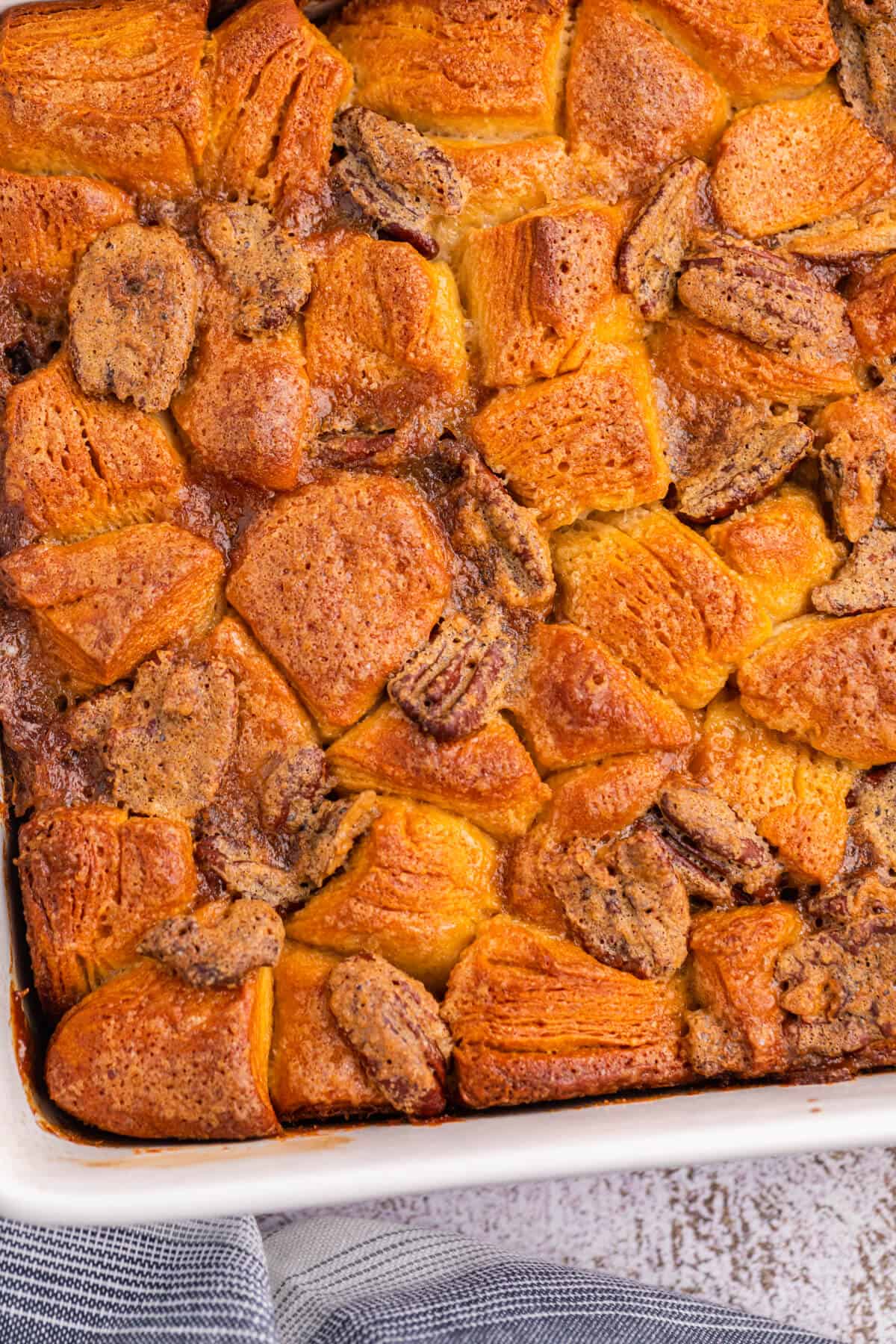 Pecan butter tart buns in a casserole dish.