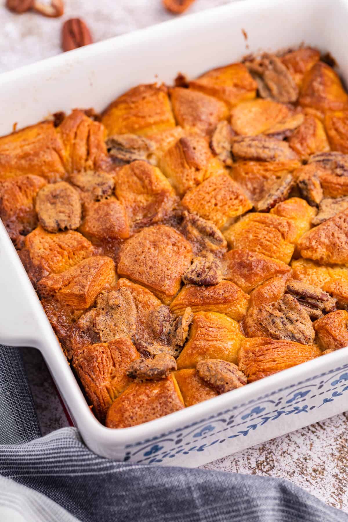 Pecan butter tart buns in a casserole dish.