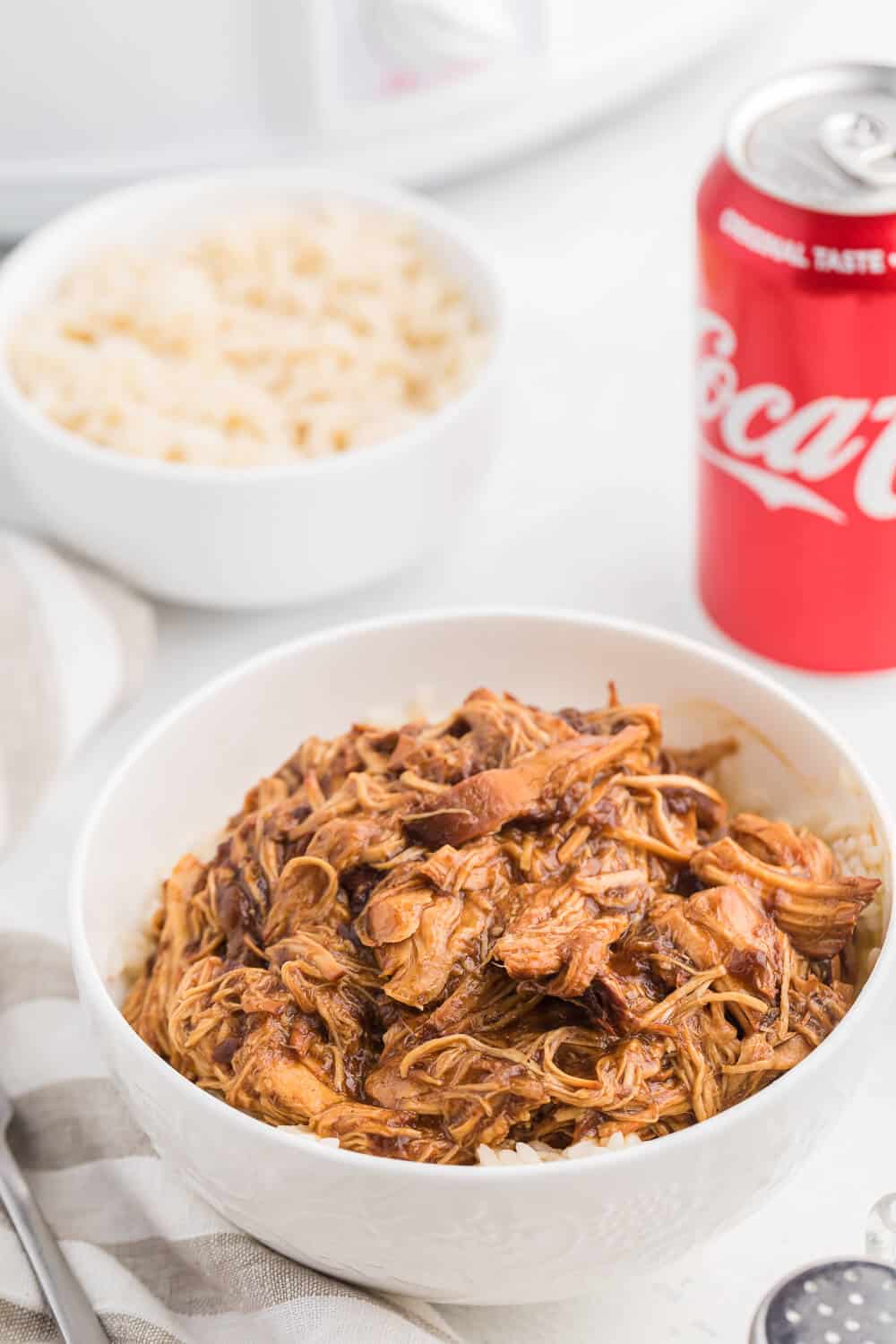 Cherry Coke Chicken - The easiest sweet and savory chicken recipe! Add some soda to your Crockpot for the most tender barbecue chicken breasts.