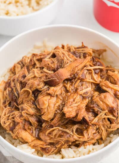 Cherry Coke Chicken - The easiest sweet and savory chicken recipe! Add some soda to your Crockpot for the most tender barbecue chicken breasts.