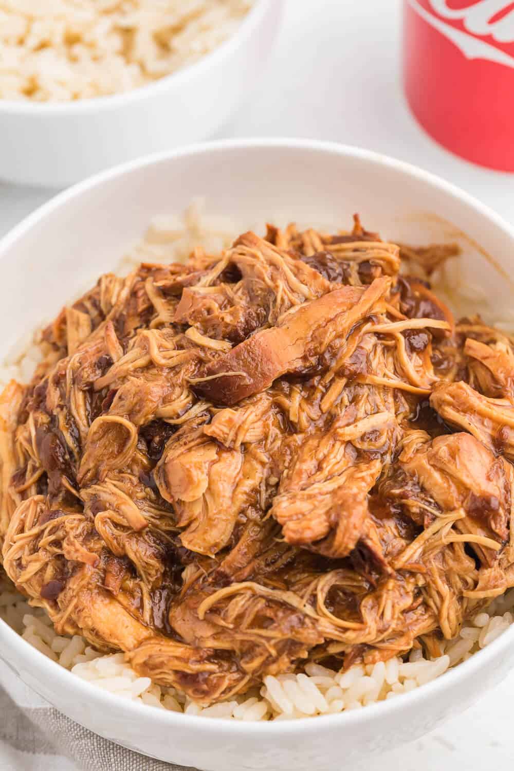 Cherry Coke Chicken - The easiest sweet and savory chicken recipe! Add some soda to your Crockpot for the most tender barbecue chicken breasts.