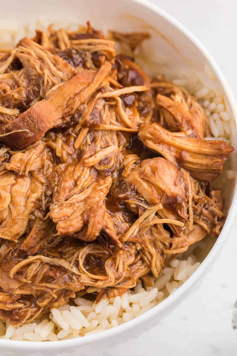 Cherry Coke Chicken - The easiest sweet and savory chicken recipe! Add some soda to your Crockpot for the most tender barbecue chicken breasts.