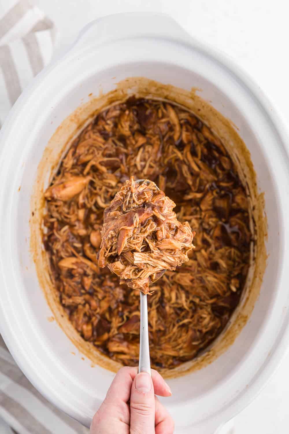 Cherry Coke Chicken - The easiest sweet and savory chicken recipe! Add some soda to your Crockpot for the most tender barbecue chicken breasts.