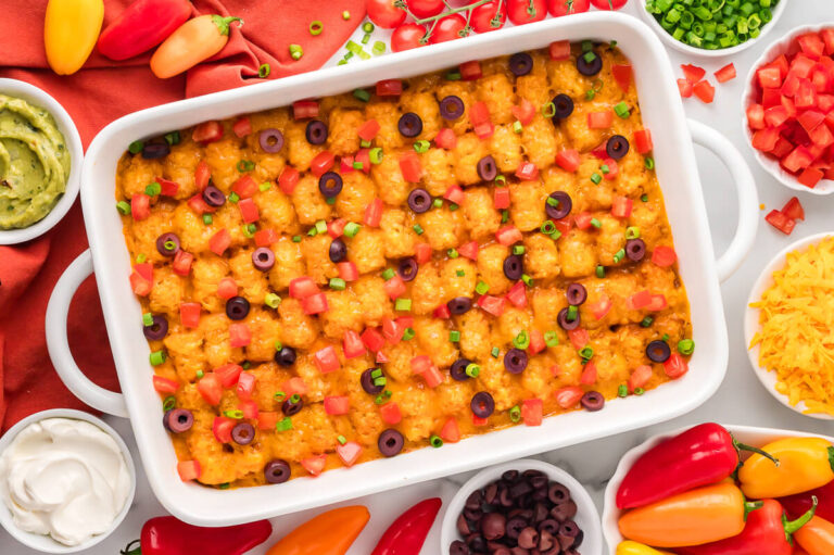 The casserole surrounded by ingredients.