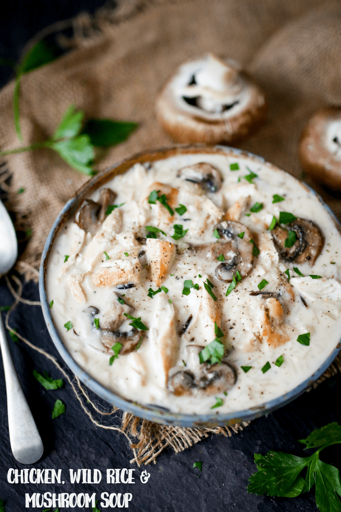 Chicken, Wild Rice & Mushroom Soup - The most comforting creamy soup ever! Savory mushrooms are the perfect veggie for this rich wild rice soup with succulent chicken.